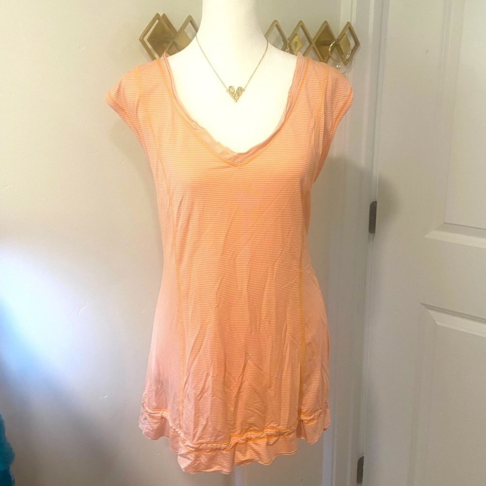 Lululemon Athletica sleeveless women’s top. Peach striped. Size 10.